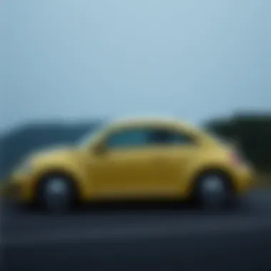 Elegant Side Profile of the 2012 Volkswagen Beetle Side profile view of the 2012 Volkswagen Beetle on a scenic road