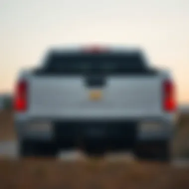 Rear view of the 2013 Chevrolet Silverado 1500 LTZ featuring its tailgate and rear light design.