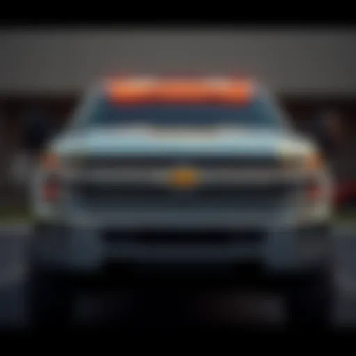 Front view of the 2015 Chevrolet Silverado 3500HD Regular Cab showcasing its bold grille and rugged design.