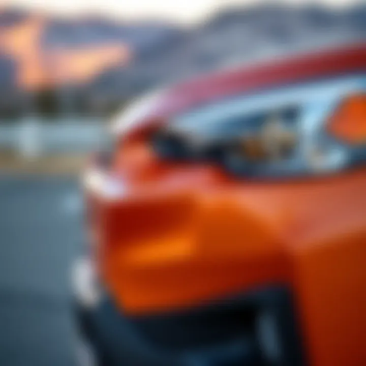 Close-up view of the 2019 Subaru Crosstrek in orange highlighting its distinct front grille and headlights
