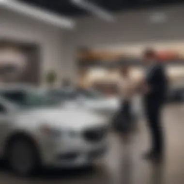 Customer interacting with a sales representative at Buick Escondido, highlighting service excellence