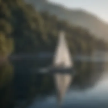 A serene sailing scene on a calm lake