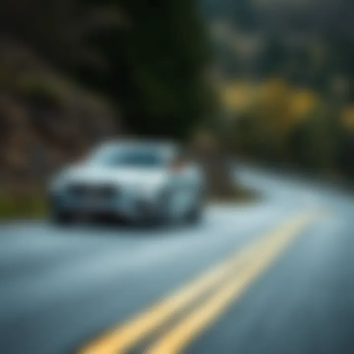 Performance on Winding Roads Midsize car on a winding road highlighting performance