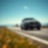 Sleek Full-Size SUV on a Scenic Road Sleek full-size SUV on a scenic road