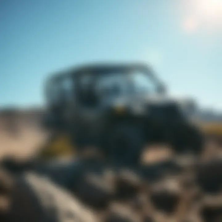 Performance in Rugged Terrain by the Wolverine Side by Side 4 Seater Action shot of the Wolverine 4 Seater navigating rugged terrain demonstrating performance