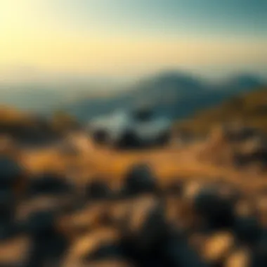 A scenic landscape view with a mini SUV driving through rugged terrain