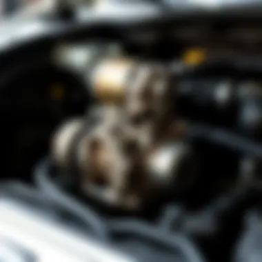 Examining the Starter Motor Starter motor assembly showing wear and tear