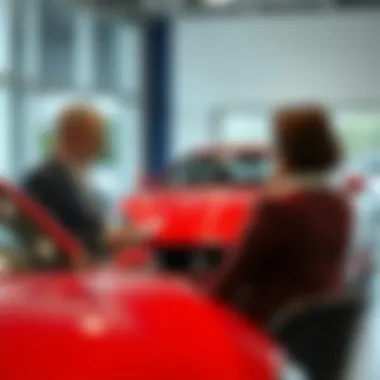 A customer discussing financing options with a dealership representative.