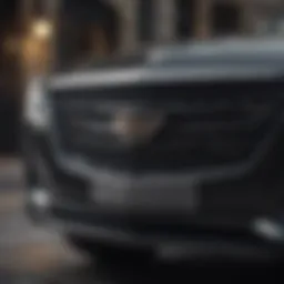 The iconic front grille of a luxury Cadillac showcasing its elegance.